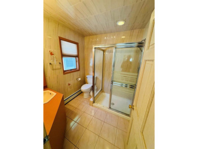 Welcome to your dream home in the highly desirable Village of on Port Jefferson Country Club At Harbor Hills in New York - for sale on GolfHomes.com, golf home, golf lot