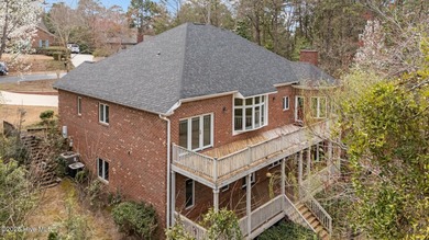 Take in peaceful views of Lake Pinehurst at this inviting, all on Pinehurst Resort and Country Club in North Carolina - for sale on GolfHomes.com, golf home, golf lot