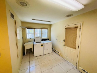Welcome to your dream home in the highly desirable Village of on Port Jefferson Country Club At Harbor Hills in New York - for sale on GolfHomes.com, golf home, golf lot