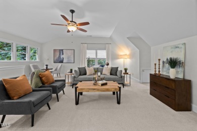 Nestled on a desirable corner lot, surrounded by mature trees in on Devils Ridge Golf Club in North Carolina - for sale on GolfHomes.com, golf home, golf lot