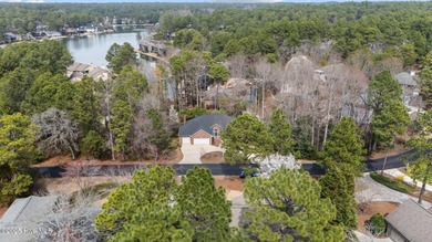 Take in peaceful views of Lake Pinehurst at this inviting, all on Pinehurst Resort and Country Club in North Carolina - for sale on GolfHomes.com, golf home, golf lot
