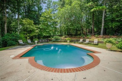 Welcome to this gorgeous three-sided brick European style ranch on Brookfield Country Club in Georgia - for sale on GolfHomes.com, golf home, golf lot