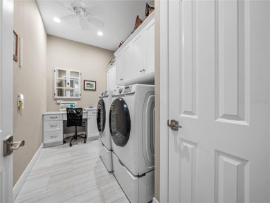 Under contract-accepting backup offers. Luxury living at its on Lake Jovita Golf and Country Club in Florida - for sale on GolfHomes.com, golf home, golf lot