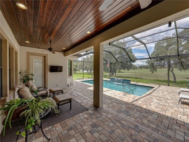 Under contract-accepting backup offers. Luxury living at its on Lake Jovita Golf and Country Club in Florida - for sale on GolfHomes.com, golf home, golf lot