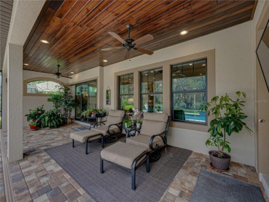 Under contract-accepting backup offers. Luxury living at its on Lake Jovita Golf and Country Club in Florida - for sale on GolfHomes.com, golf home, golf lot