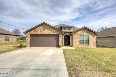 GOLF COURSE VIEW!  Enjoy this inviting 4-bedroom, 2-bath home on Neosho Municipal Golf Course in Missouri - for sale on GolfHomes.com, golf home, golf lot