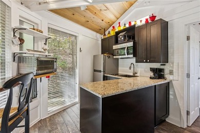 Experience tranquility and breathtaking views at this on Big Canoe Golf Club - Cherokee in Georgia - for sale on GolfHomes.com, golf home, golf lot