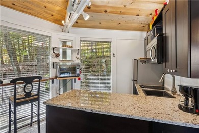 Experience tranquility and breathtaking views at this on Big Canoe Golf Club - Cherokee in Georgia - for sale on GolfHomes.com, golf home, golf lot