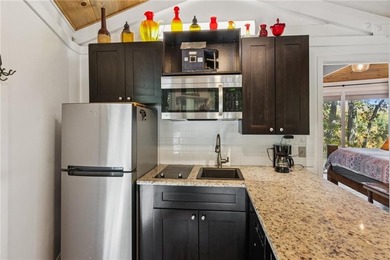 Experience tranquility and breathtaking views at this on Big Canoe Golf Club - Cherokee in Georgia - for sale on GolfHomes.com, golf home, golf lot