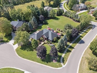 Nestled in the prestigious Prestwick Village Golf Course on Prestwick Village Golf Club in Michigan - for sale on GolfHomes.com, golf home, golf lot