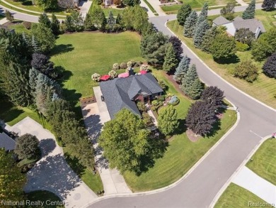 Nestled in the prestigious Prestwick Village Golf Course on Prestwick Village Golf Club in Michigan - for sale on GolfHomes.com, golf home, golf lot