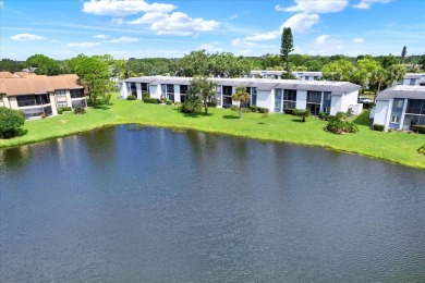 Welcome to this beautiful 2 Bedroom 2 Bath pond view condo in on East Lake Woodlands Country Club in Florida - for sale on GolfHomes.com, golf home, golf lot