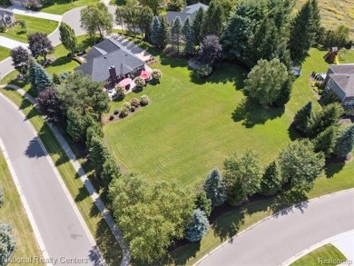 Nestled in the prestigious Prestwick Village Golf Course on Prestwick Village Golf Club in Michigan - for sale on GolfHomes.com, golf home, golf lot