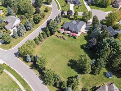 Nestled in the prestigious Prestwick Village Golf Course on Prestwick Village Golf Club in Michigan - for sale on GolfHomes.com, golf home, golf lot
