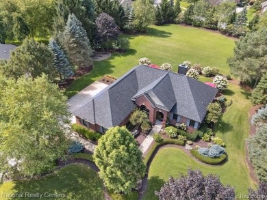 Nestled in the prestigious Prestwick Village Golf Course on Prestwick Village Golf Club in Michigan - for sale on GolfHomes.com, golf home, golf lot