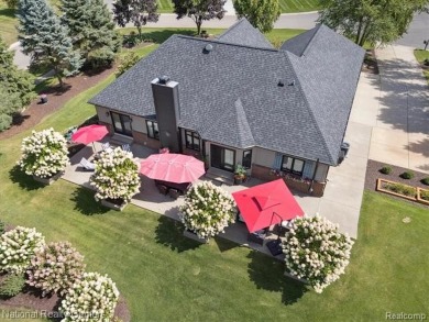 Nestled in the prestigious Prestwick Village Golf Course on Prestwick Village Golf Club in Michigan - for sale on GolfHomes.com, golf home, golf lot