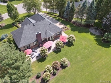 Nestled in the prestigious Prestwick Village Golf Course on Prestwick Village Golf Club in Michigan - for sale on GolfHomes.com, golf home, golf lot