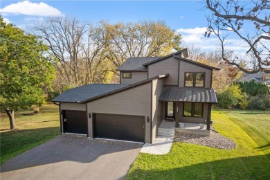 Discover the perfect blend of new construction luxury without on Golden Valley Golf and Country Club in Minnesota - for sale on GolfHomes.com, golf home, golf lot