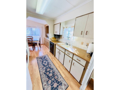 Looking for a cozy winter getaway or a year-round haven? This on Pine Lakes Country Club in Florida - for sale on GolfHomes.com, golf home, golf lot