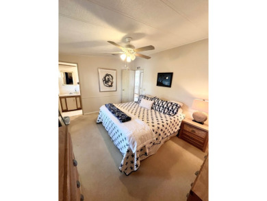 Looking for a cozy winter getaway or a year-round haven? This on Pine Lakes Country Club in Florida - for sale on GolfHomes.com, golf home, golf lot
