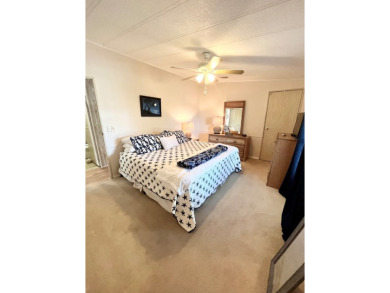 Looking for a cozy winter getaway or a year-round haven? This on Pine Lakes Country Club in Florida - for sale on GolfHomes.com, golf home, golf lot