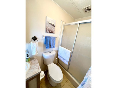 Looking for a cozy winter getaway or a year-round haven? This on Pine Lakes Country Club in Florida - for sale on GolfHomes.com, golf home, golf lot