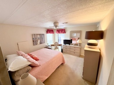 Looking for a cozy winter getaway or a year-round haven? This on Pine Lakes Country Club in Florida - for sale on GolfHomes.com, golf home, golf lot
