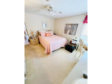 Looking for a cozy winter getaway or a year-round haven? This on Pine Lakes Country Club in Florida - for sale on GolfHomes.com, golf home, golf lot