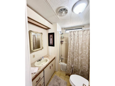 Looking for a cozy winter getaway or a year-round haven? This on Pine Lakes Country Club in Florida - for sale on GolfHomes.com, golf home, golf lot