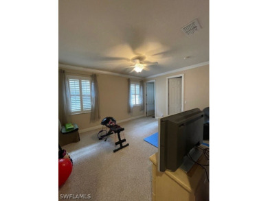 Step into the covered entry and elegant foyer, a formal dining on Estero Country Club in Florida - for sale on GolfHomes.com, golf home, golf lot