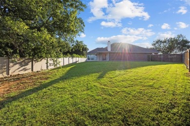 Experience the Best of Burleson Living at 416 Hidden Lake Court on Hidden Creek Golf Course in Texas - for sale on GolfHomes.com, golf home, golf lot