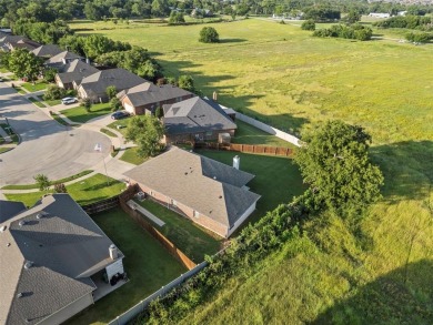 Experience the Best of Burleson Living at 416 Hidden Lake Court on Hidden Creek Golf Course in Texas - for sale on GolfHomes.com, golf home, golf lot
