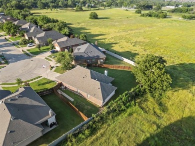 Experience the Best of Burleson Living at 416 Hidden Lake Court on Hidden Creek Golf Course in Texas - for sale on GolfHomes.com, golf home, golf lot