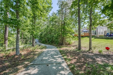 Modern maintenance free transitional, SUPER modern OPEN AIRY on The Tradition Golf Club At Royal New Kent in Virginia - for sale on GolfHomes.com, golf home, golf lot
