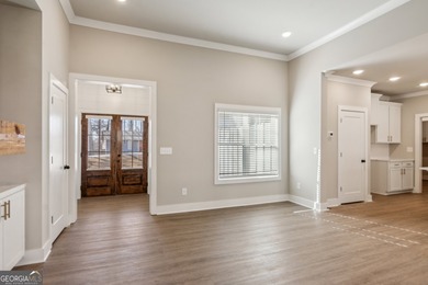 Nestled in the prestigious gated community of The Orchard in on The Orchard Golf and Country Club in Georgia - for sale on GolfHomes.com, golf home, golf lot