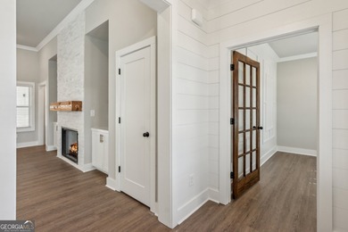 Nestled in the prestigious gated community of The Orchard in on The Orchard Golf and Country Club in Georgia - for sale on GolfHomes.com, golf home, golf lot