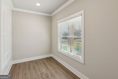 Nestled in the prestigious gated community of The Orchard in on The Orchard Golf and Country Club in Georgia - for sale on GolfHomes.com, golf home, golf lot