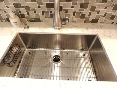 Welcome to luxury 55+ living at Wynmoor Country Club! This on Wynmoor Golf Course in Florida - for sale on GolfHomes.com, golf home, golf lot