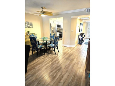 Welcome to luxury 55+ living at Wynmoor Country Club! This on Wynmoor Golf Course in Florida - for sale on GolfHomes.com, golf home, golf lot