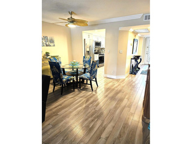 Welcome to luxury 55+ living at Wynmoor Country Club! This on Wynmoor Golf Course in Florida - for sale on GolfHomes.com, golf home, golf lot