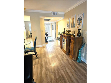 Welcome to luxury 55+ living at Wynmoor Country Club! This on Wynmoor Golf Course in Florida - for sale on GolfHomes.com, golf home, golf lot