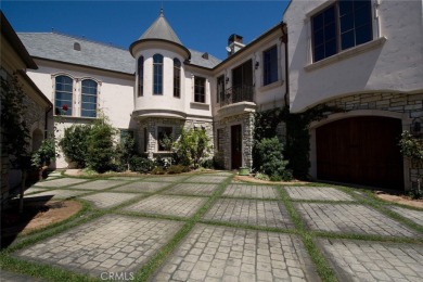 Step inside a timeless Old-World European retreat where every on Spanish Hills Golf and Country Club in California - for sale on GolfHomes.com, golf home, golf lot