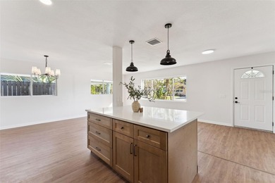 One or more photo(s) has been virtually stagedpletely remodeled on Country Club of Orlando in Florida - for sale on GolfHomes.com, golf home, golf lot