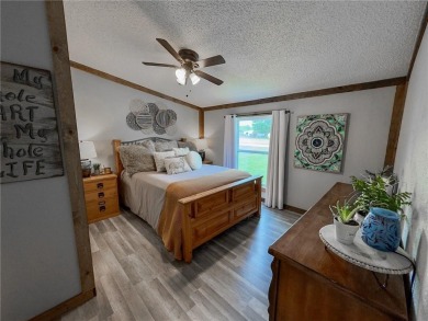 3 LOTS!!! The 3br 2 Ba updated in Rustic decor home is located on Linn Valley Lakes - Deer Trace Golf Course in Kansas - for sale on GolfHomes.com, golf home, golf lot