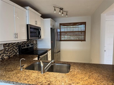 Great 3 bedrooms /2 bath, with 1124 sqft, great layout. Ceramic on Pine Island Ridge Country Club in Florida - for sale on GolfHomes.com, golf home, golf lot