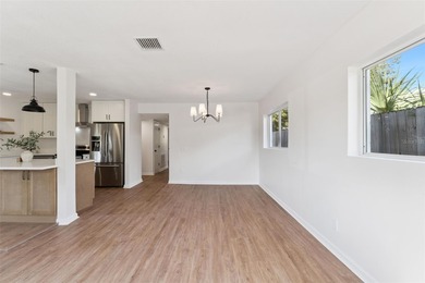 One or more photo(s) has been virtually stagedpletely remodeled on Country Club of Orlando in Florida - for sale on GolfHomes.com, golf home, golf lot