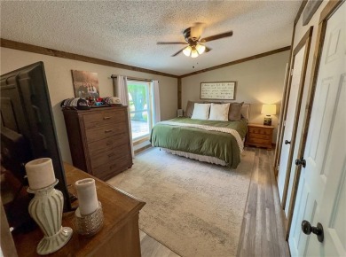3 LOTS!!! The 3br 2 Ba updated in Rustic decor home is located on Linn Valley Lakes - Deer Trace Golf Course in Kansas - for sale on GolfHomes.com, golf home, golf lot