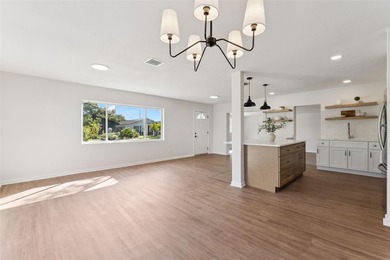 One or more photo(s) has been virtually stagedpletely remodeled on Country Club of Orlando in Florida - for sale on GolfHomes.com, golf home, golf lot