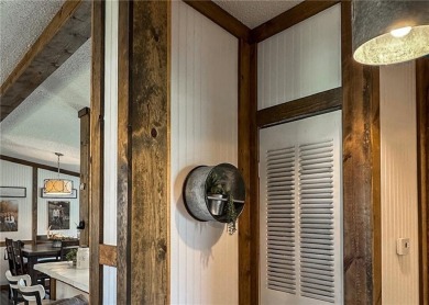 3 LOTS!!! The 3br 2 Ba updated in Rustic decor home is located on Linn Valley Lakes - Deer Trace Golf Course in Kansas - for sale on GolfHomes.com, golf home, golf lot