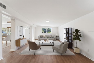 One or more photo(s) has been virtually stagedpletely remodeled on Country Club of Orlando in Florida - for sale on GolfHomes.com, golf home, golf lot